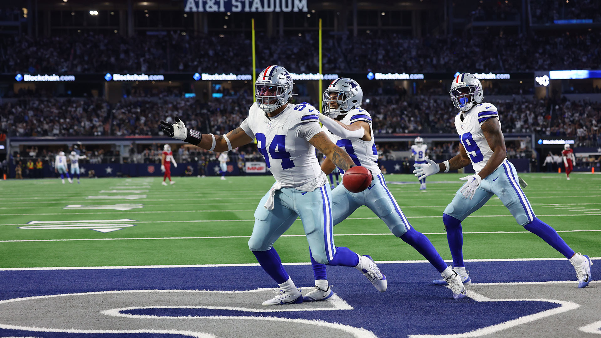 Dallas Cowboys defensive end Marshawn Kneeland (94) celebrates after he recovered a blocked punt for a touchdown in the first half of an NFL football game against the Arizona Cardinals first half of an NFL football game Monday, Nov. 3, 2025, in Arlington, Texas. (AP Photo/Richard Rodriguez)